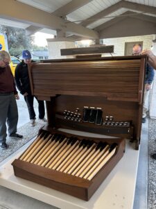 Catherine welcoming the new Allen organ.